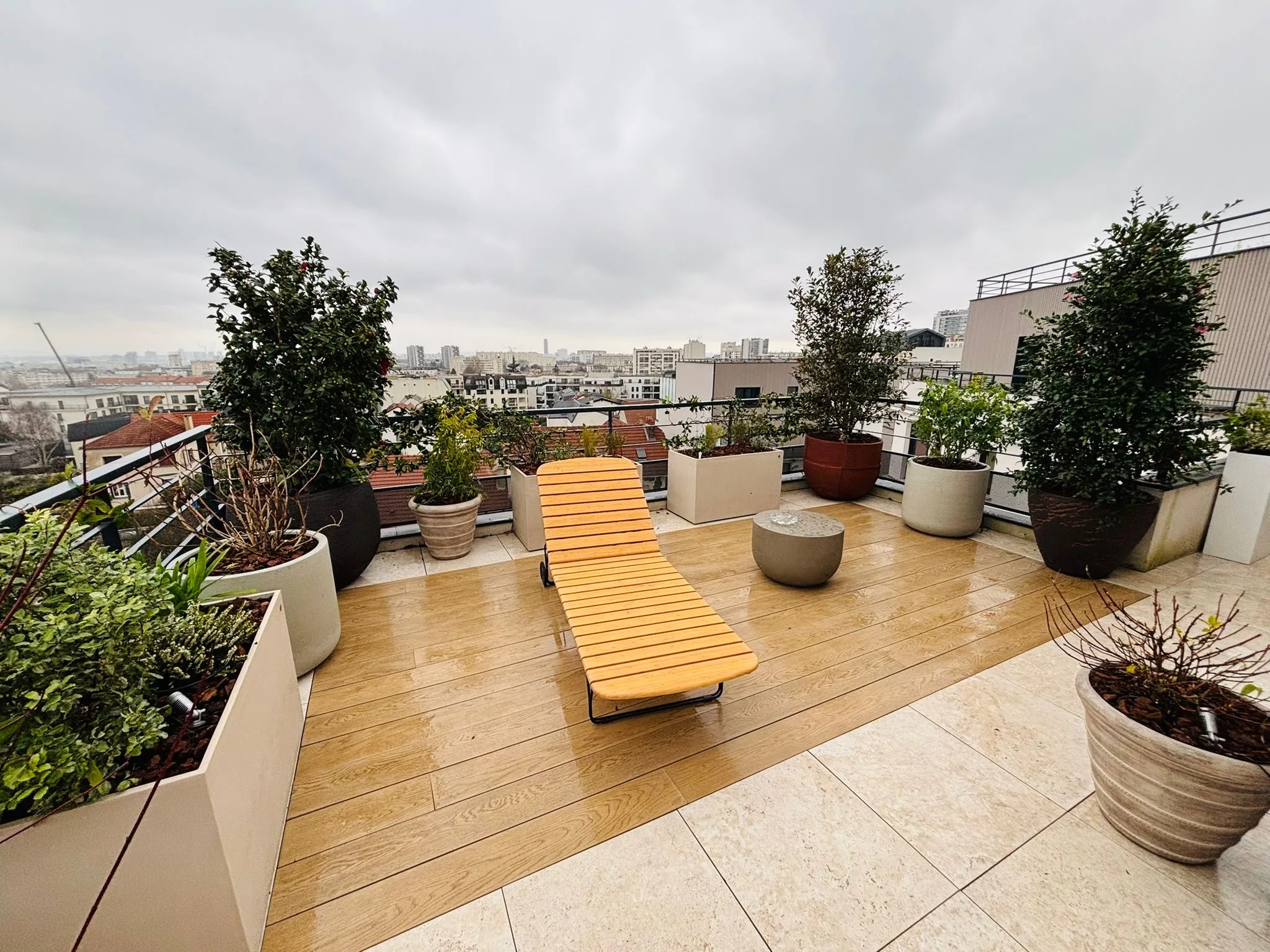 photo d'un toit terrasse après aménagement par la société Terrasse et Jardin de Paris
